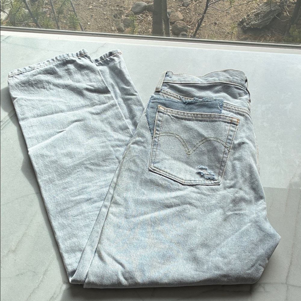 Levi’s 501 Jeans with Patchwork Details.